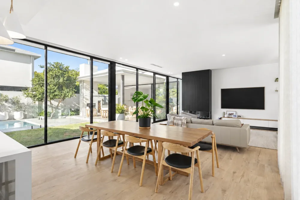 Plants bringing greenery into a living and dining space